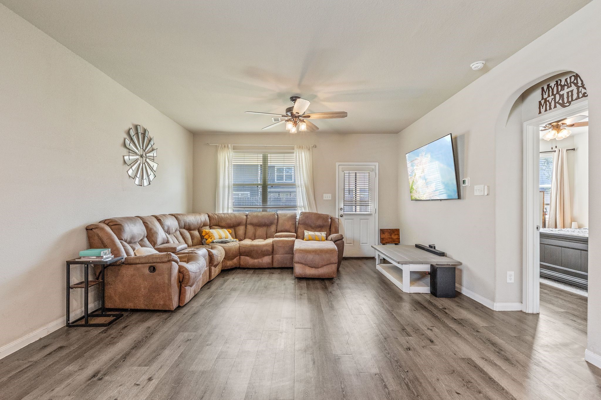 2221 Raider Drive Conroe, TX 77301 - Photo 18 of 42 a living room with furniture and a large window