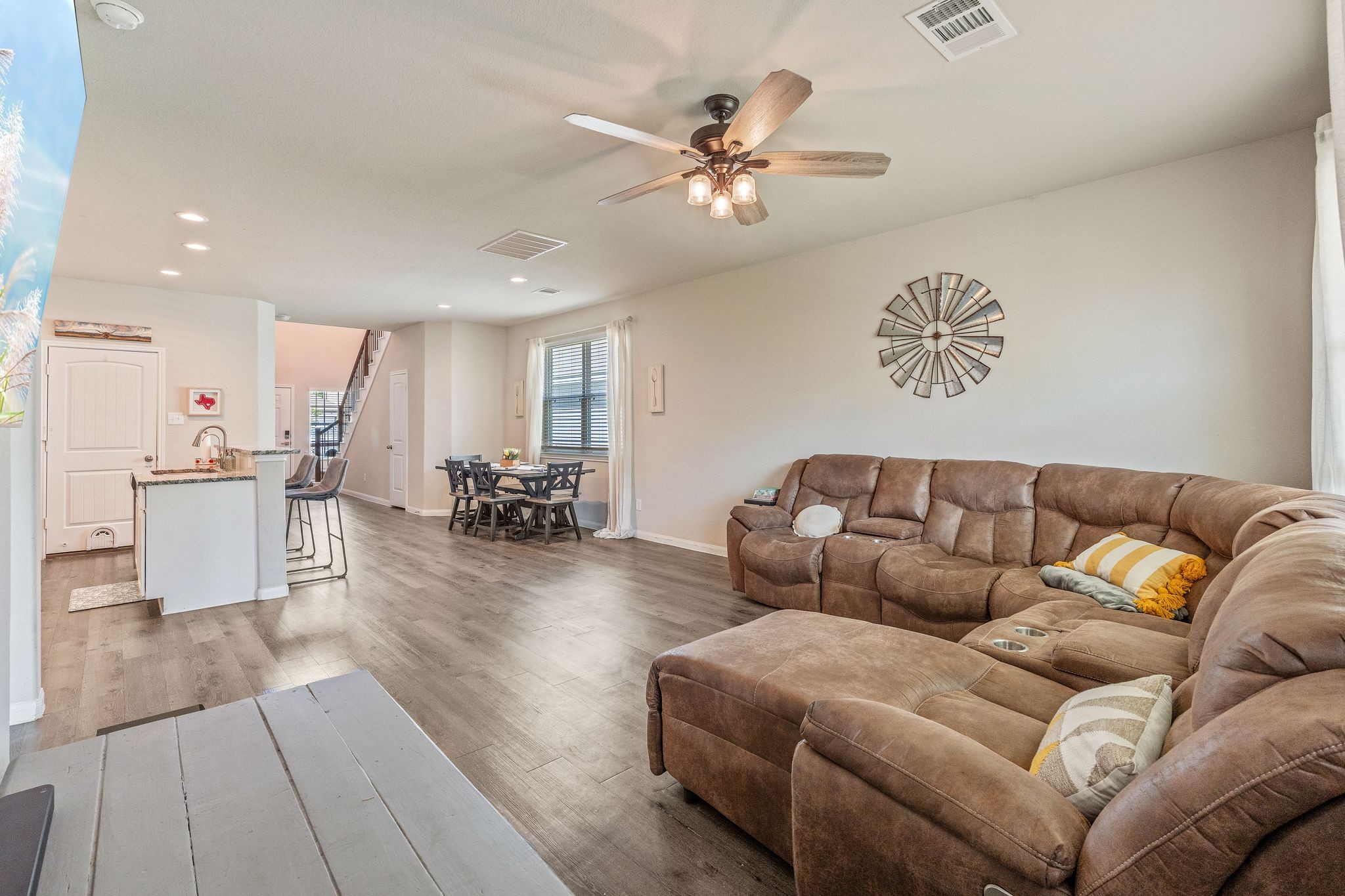 2221 Raider Drive Conroe, TX 77301 - Photo 19 of 42 a living room with furniture and kitchen view