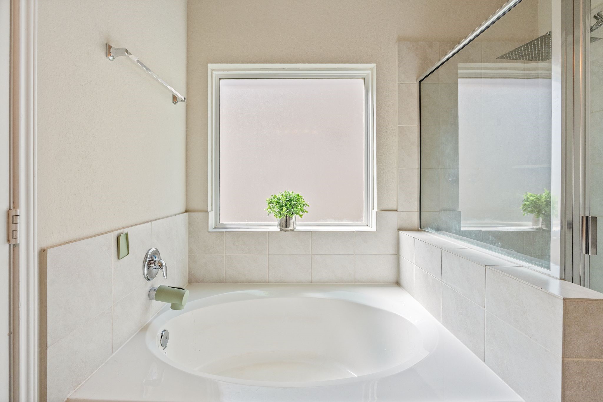 2221 Raider Drive Conroe, TX 77301 - Photo 26 of 42 a white bath tub with a shower