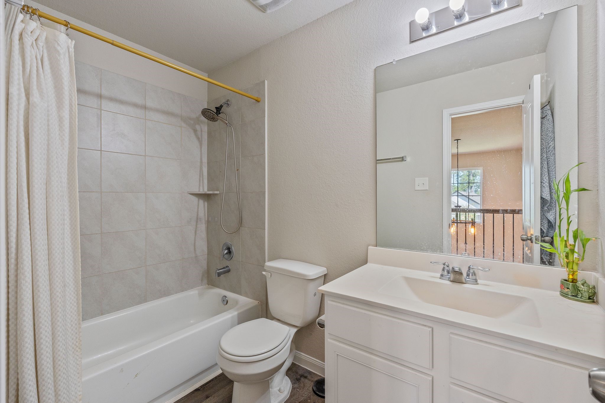 2221 Raider Drive Conroe, TX 77301 - Photo 30 of 42 a bathroom with a sink toilet and shower