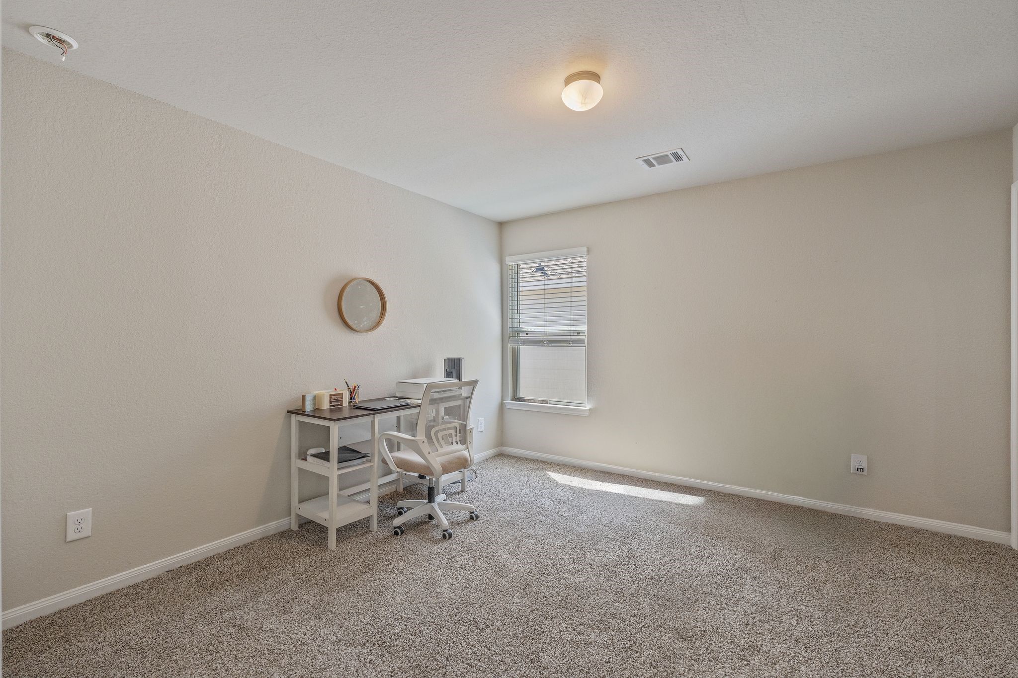 2221 Raider Drive Conroe, TX 77301 - Photo 31 of 42 a view of a room with a table and chairs