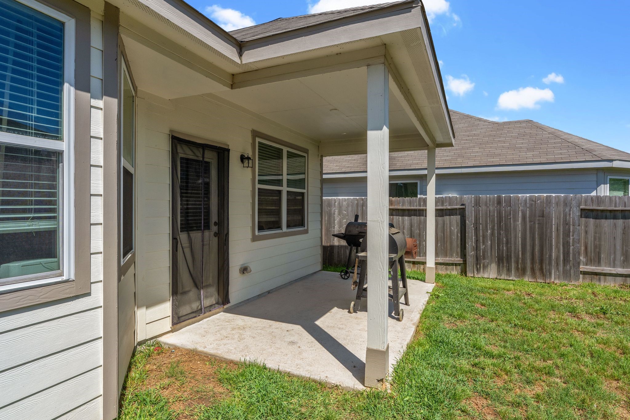 2221 Raider Drive Conroe, TX 77301 - Photo 37 of 42 a view of a house with backyard and porch