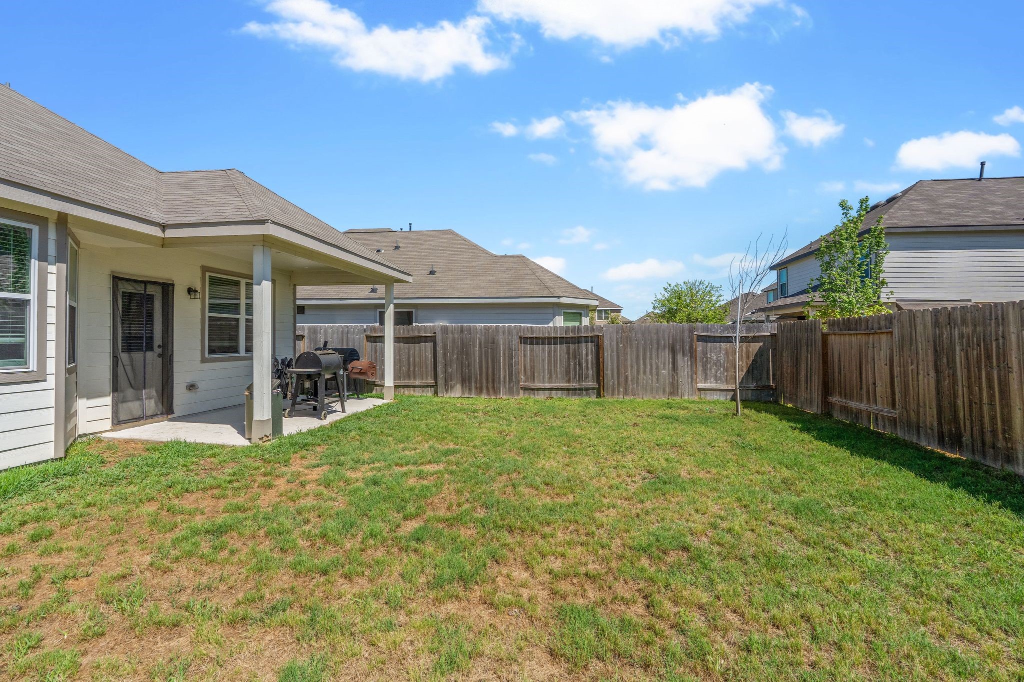 2221 Raider Drive Conroe, TX 77301 - Photo 39 of 42 a view of a house with backyard and porch