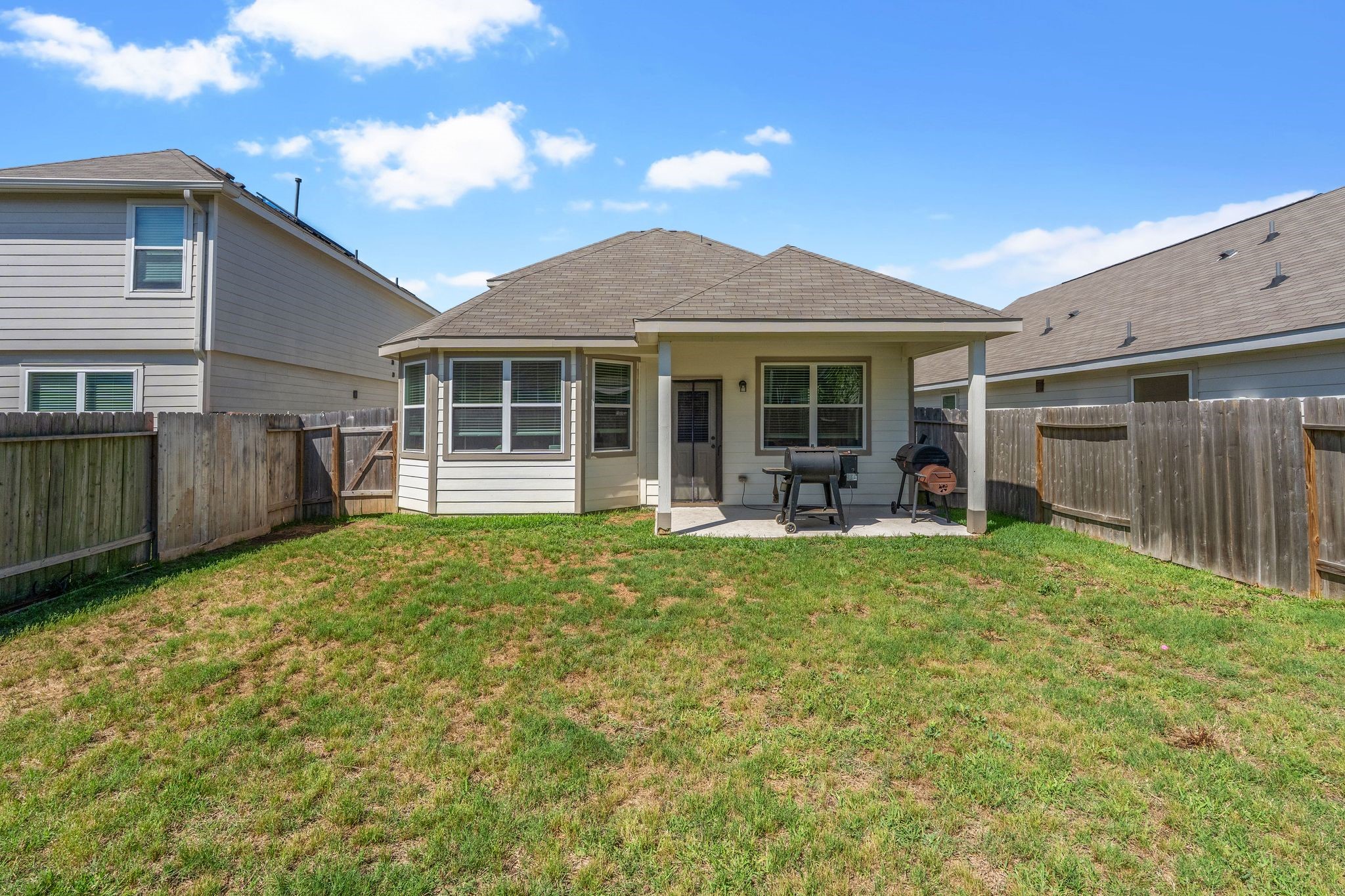 2221 Raider Drive Conroe, TX 77301 - Photo 40 of 42 a view of a house with backyard and porch