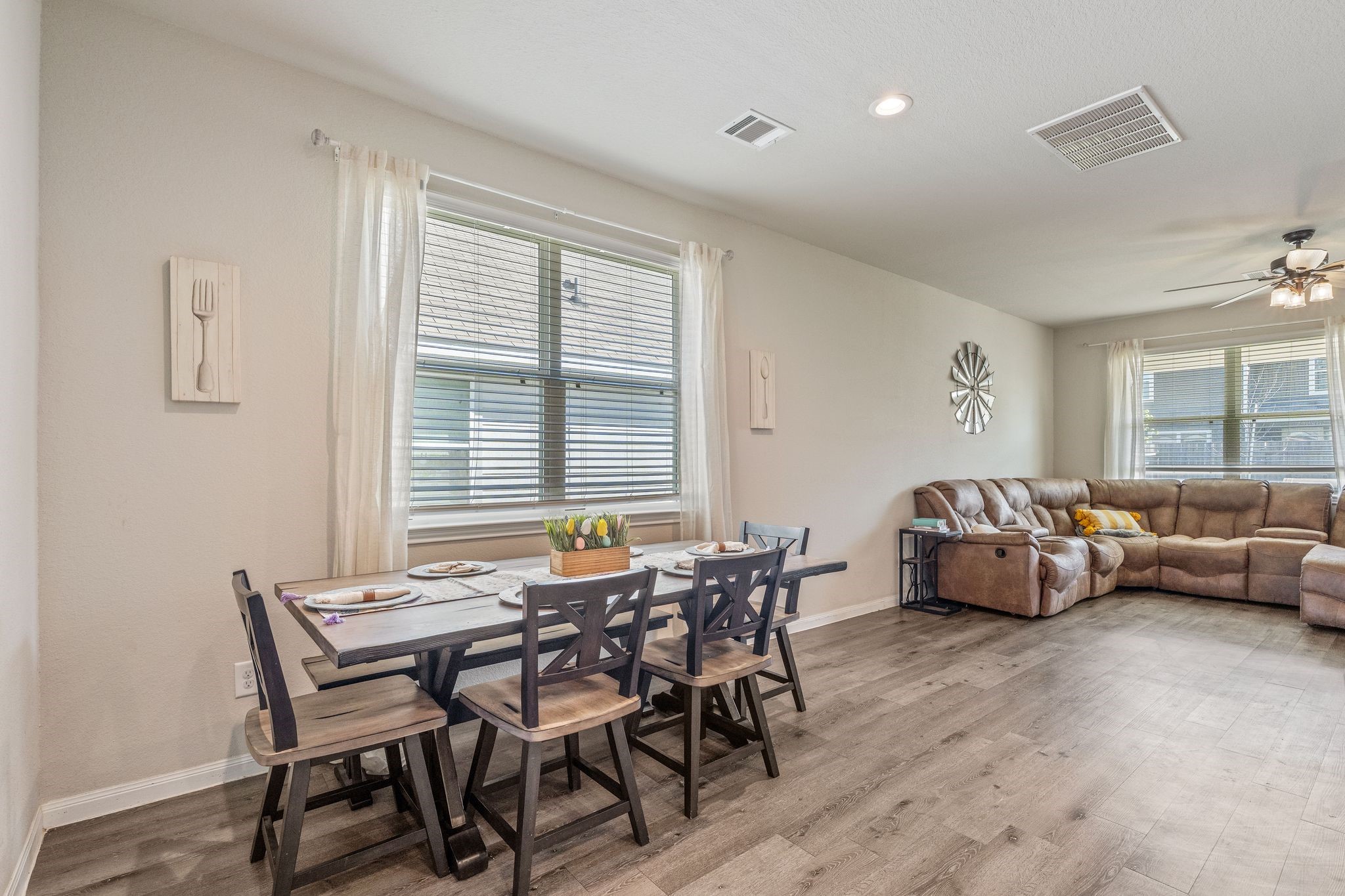 2221 Raider Drive Conroe, TX 77301 - Photo 7 of 42 a view of a dining room with furniture and windows
