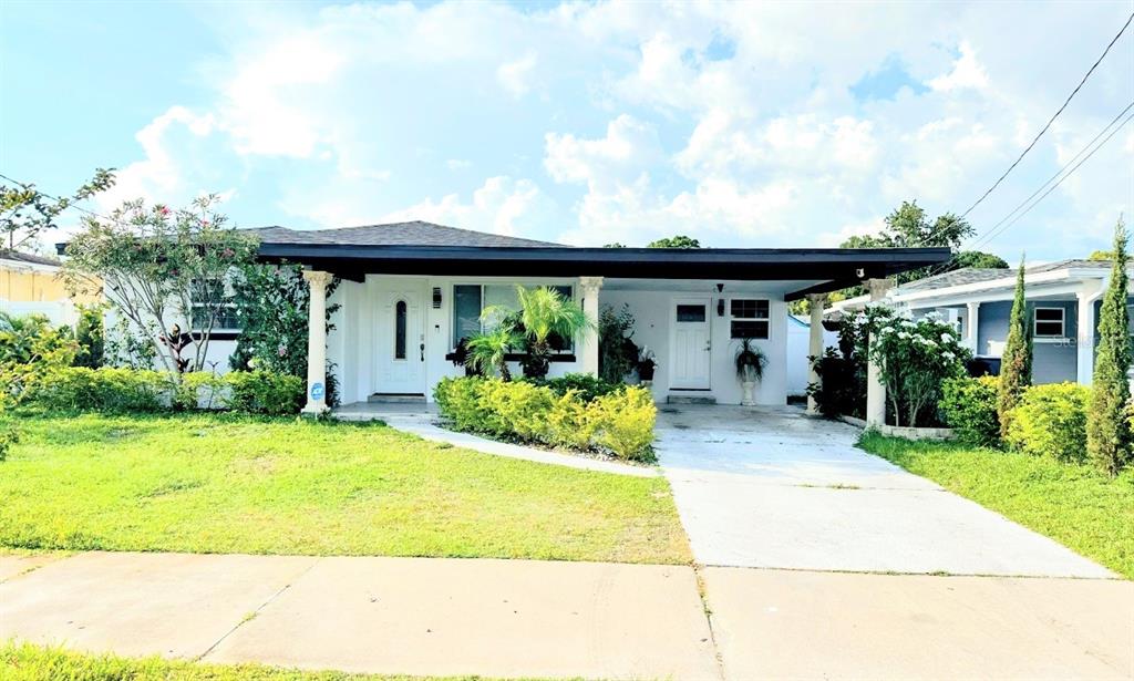 a front view of house with garage