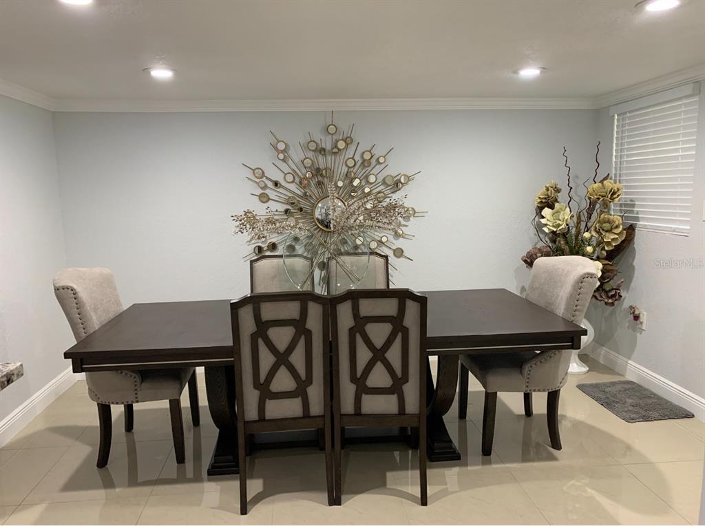 2719 West Braddock Street Tampa, FL 33607 - Photo 13 of 29 a view of a dining room with furniture