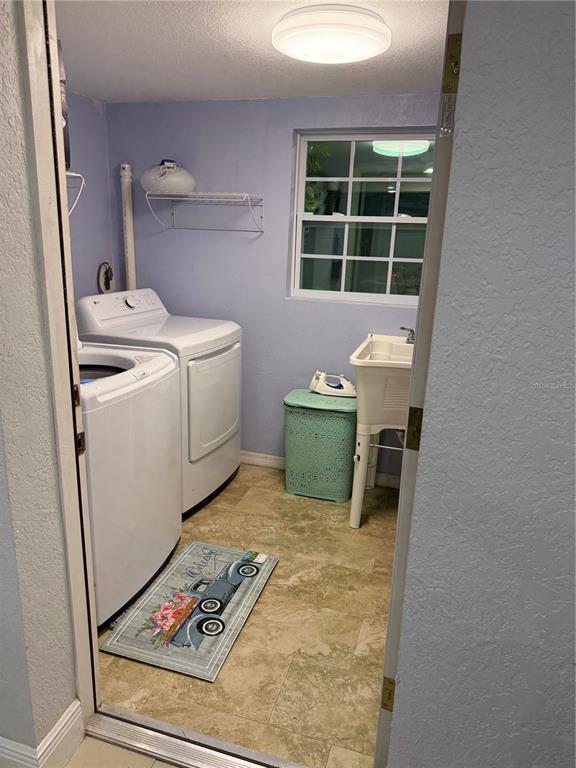 2719 West Braddock Street Tampa, FL 33607 - Photo 22 of 29 a utility room with dryer and washer