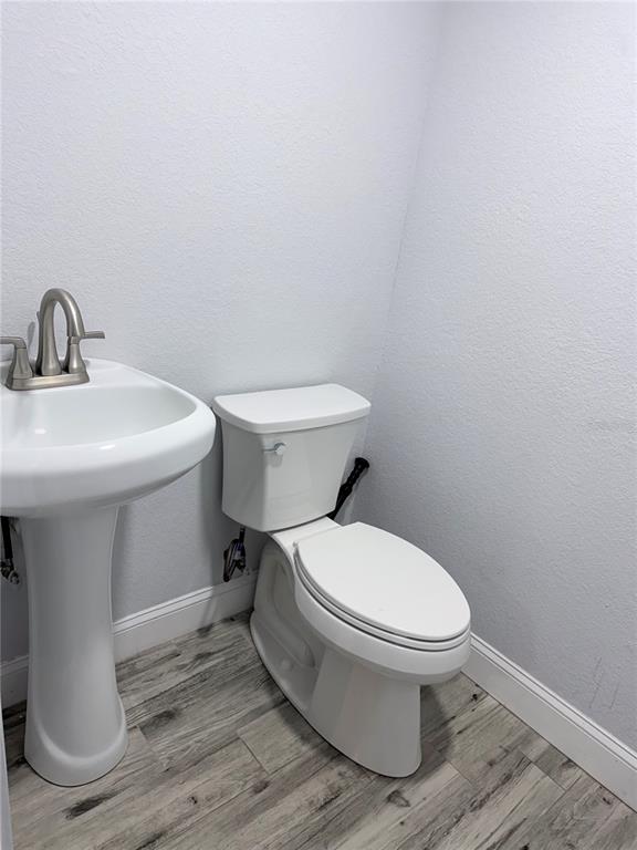 2719 West Braddock Street Tampa, FL 33607 - Photo 24 of 29 a bathroom with a sink and a toilet