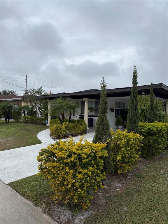 2719 West Braddock Street Tampa, FL 33607 - Photo 3 of 29 front view of a house with a yard