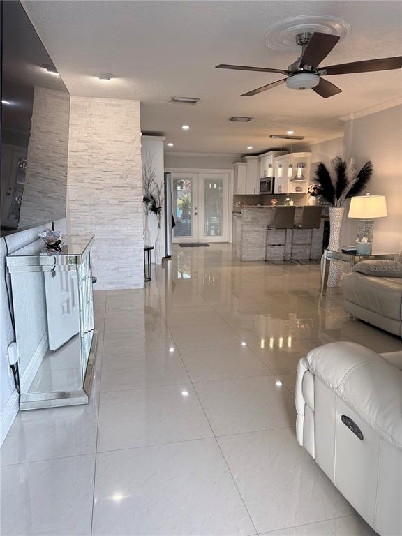 2719 West Braddock Street Tampa, FL 33607 - Photo 5 of 29 a lobby with furniture and a chandelier