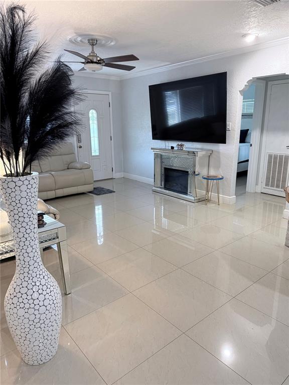 2719 West Braddock Street Tampa, FL 33607 - Photo 7 of 29 a living room with furniture and a flat screen tv