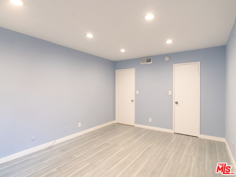 15511 Sherman Way, Unit 17 Van Nuys, CA 91406 - Photo 16 of 47 a view of an empty room