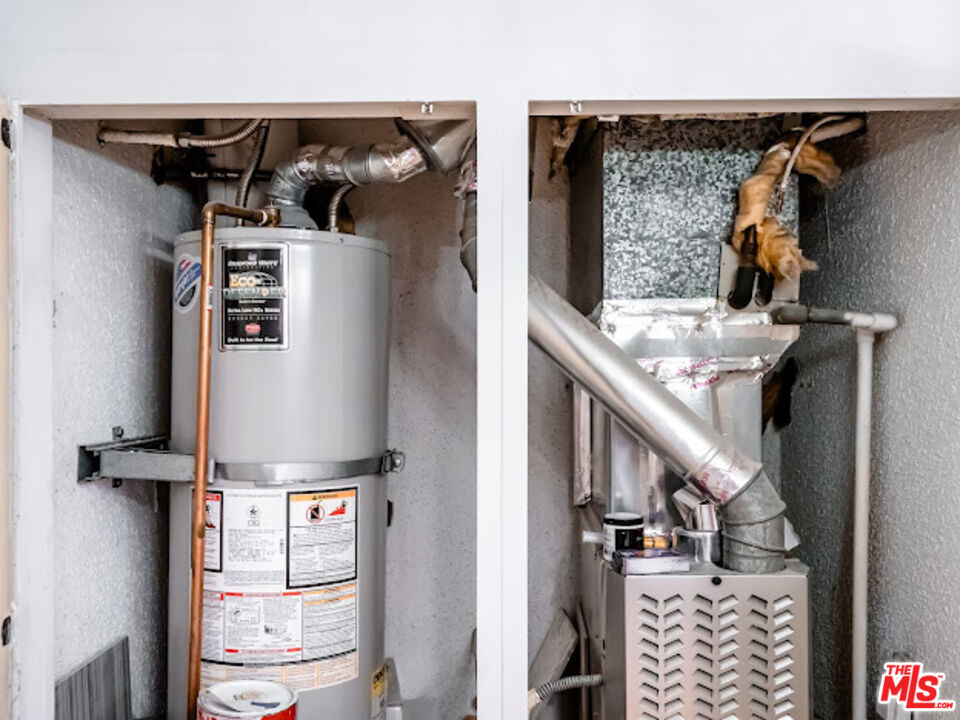 15511 Sherman Way, Unit 17 Van Nuys, CA 91406 - Photo 20 of 47 walk in closet with window and glass door