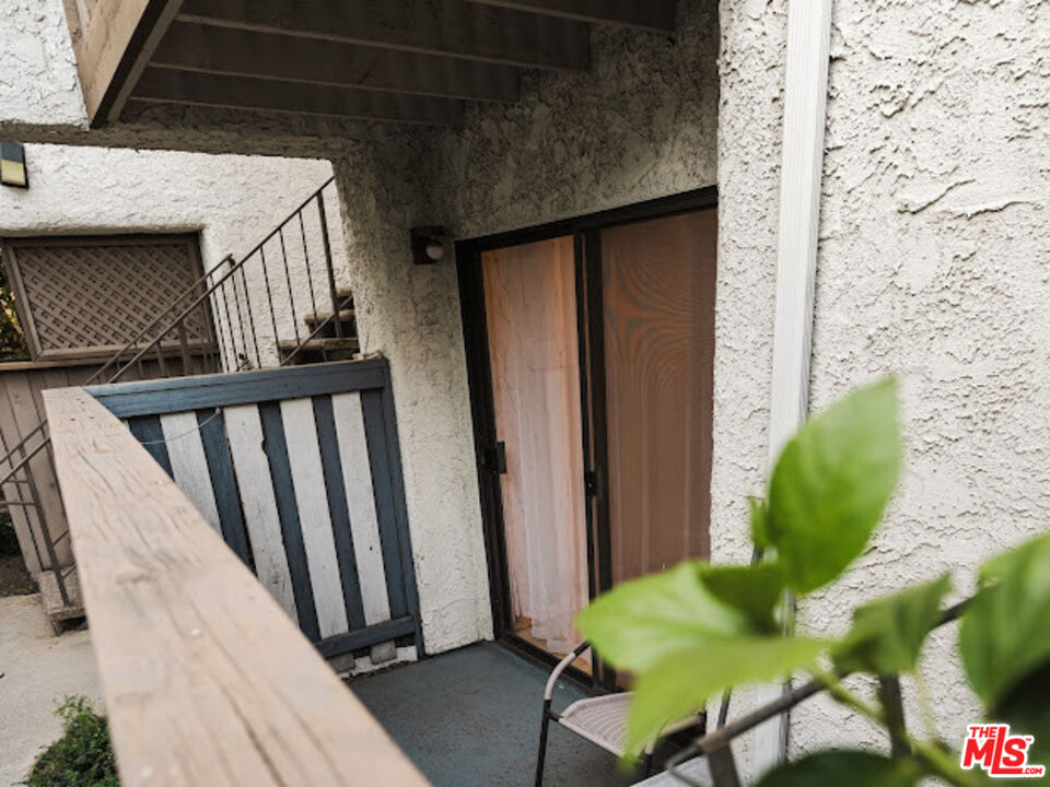 15511 Sherman Way, Unit 17 Van Nuys, CA 91406 - Photo 33 of 47 a view of a porch with furniture