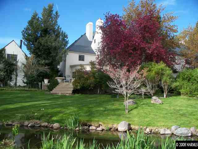 2700 Holcomb Ranch Lane Reno, NV 89511 - Photo 2 of 9 a view of a house with a backyard