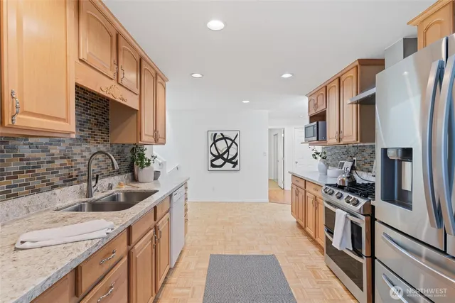 a bathroom with a tub and a shower