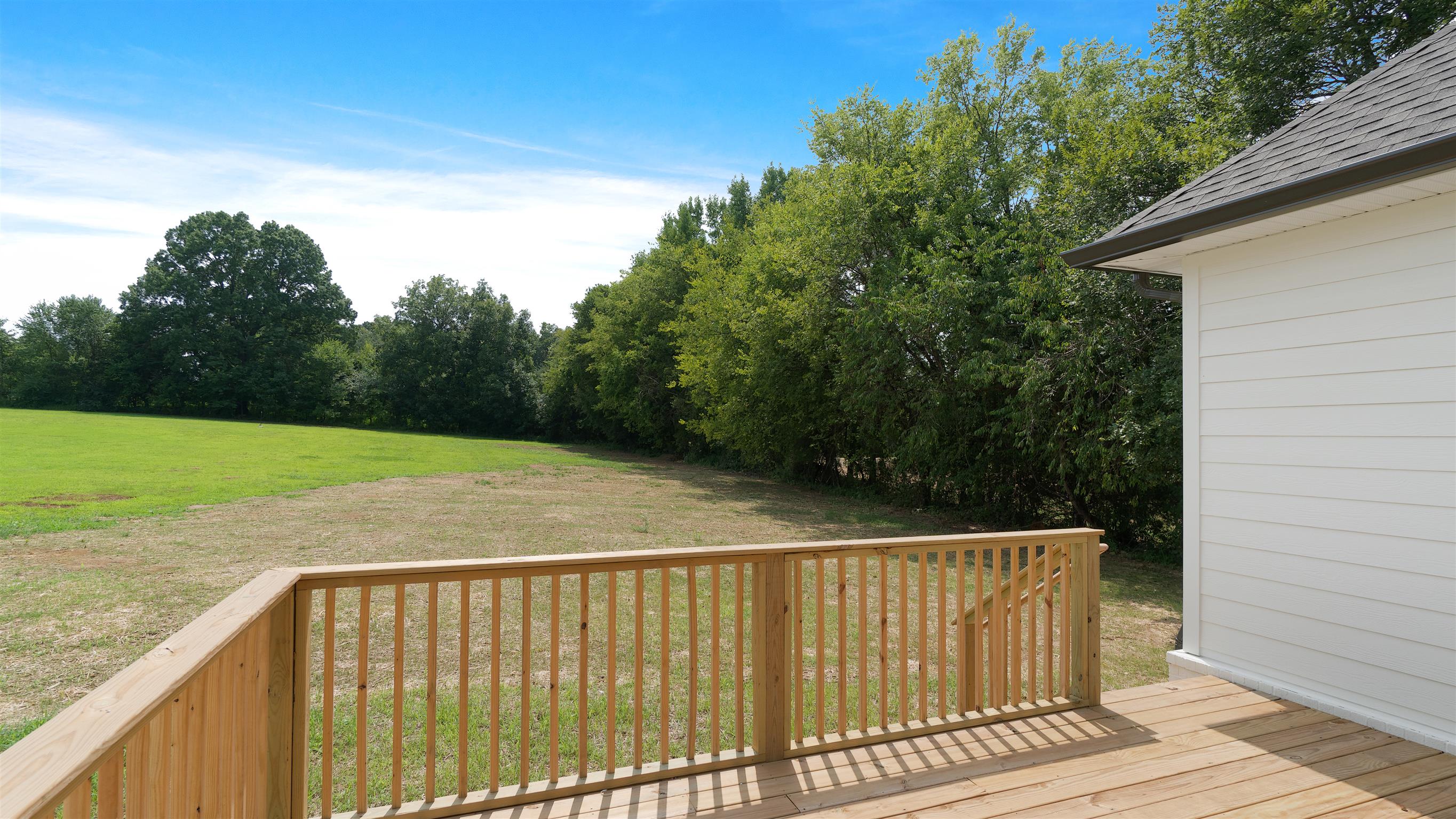 485 Tom Link Road Cottontown, TN 37048 - Photo 28 of 30 a view of outdoor space with swimming pool and trees in the background