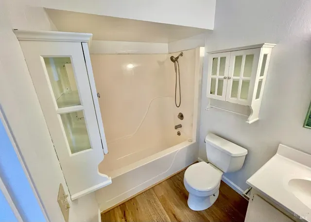 a view of a room with a large window