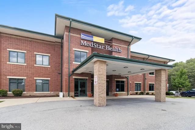 a view of water with sign board