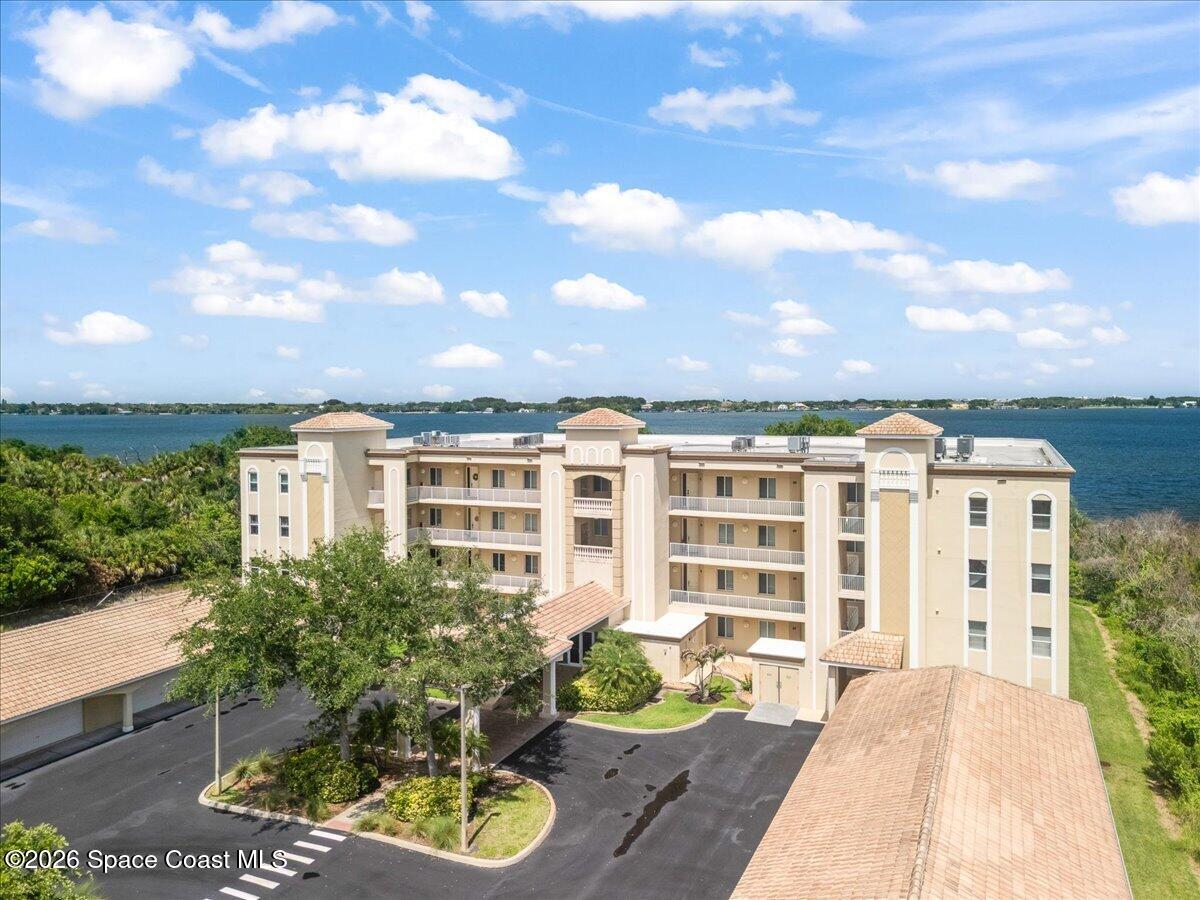 6005 Highway 1, Unit 101 Rockledge, FL 32955 - Photo 1 of 57 a view of a building with a garden