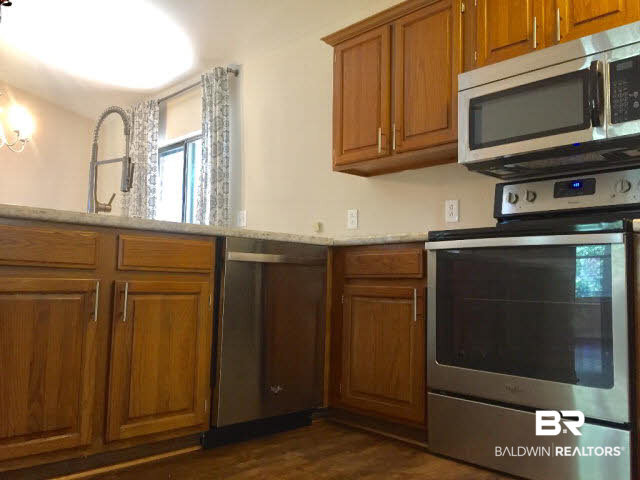 623 East Gate Circle Foley, AL 36535 - Photo 26 of 40 wood cainets