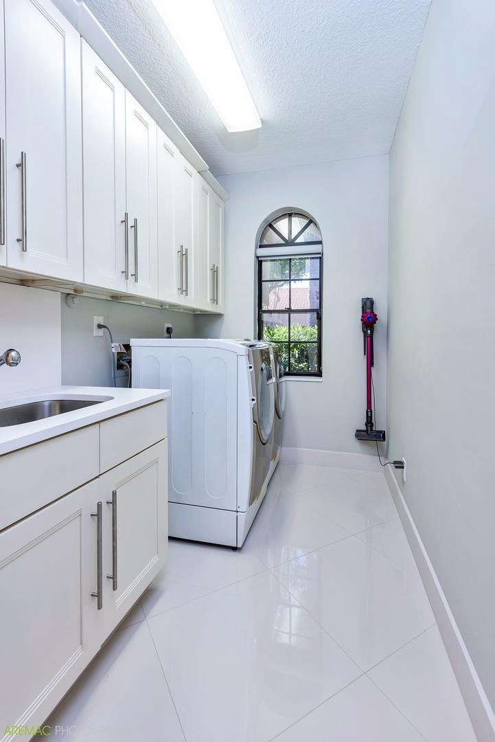 5900 Northwest 21st Avenue Boca Raton, FL 33496 - Photo 18 of 37 laundry room with sink