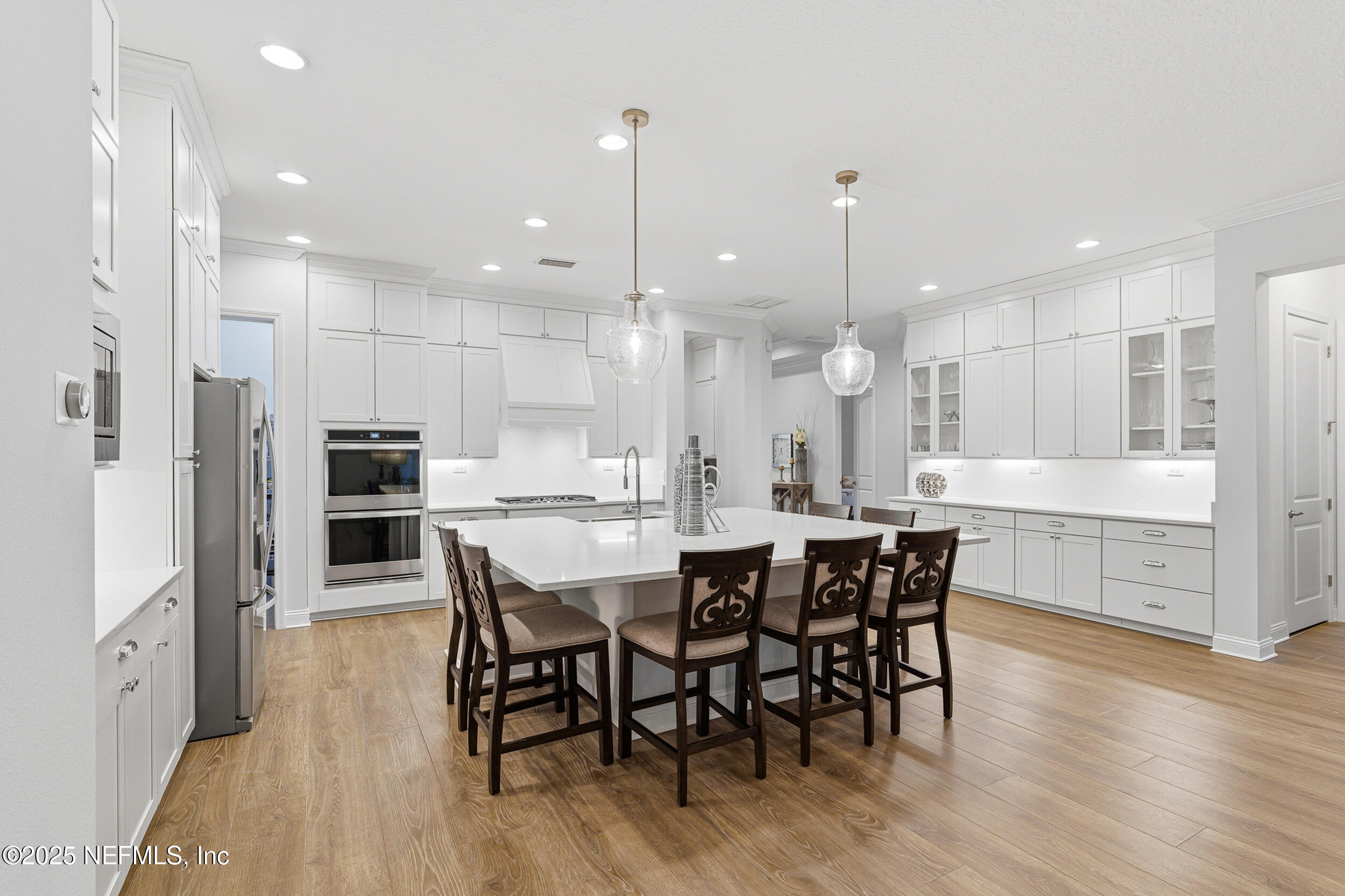 375 Kirkside Avenue St. Augustine, FL 32095 - Photo 12 of 49 a large kitchen with a table and chairs
