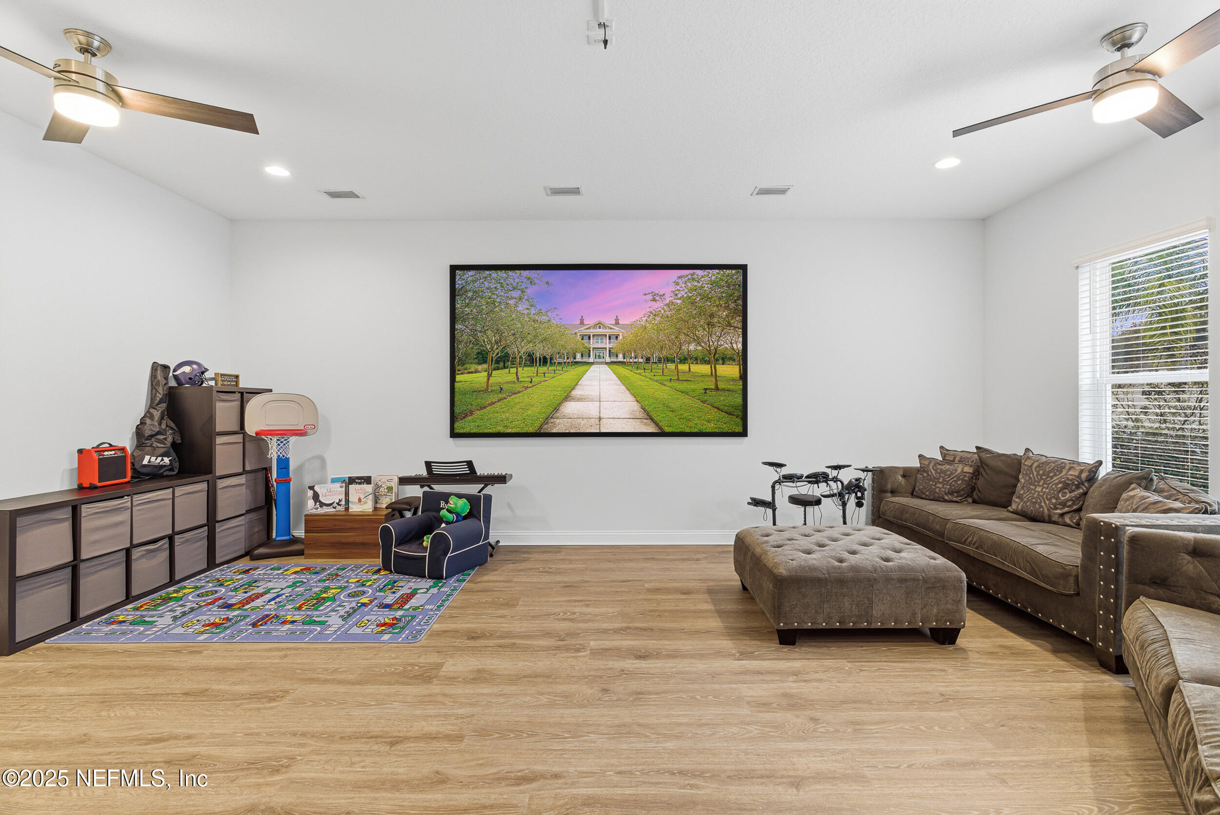 375 Kirkside Avenue St. Augustine, FL 32095 - Photo 23 of 49 a living room with furniture and a flat screen tv