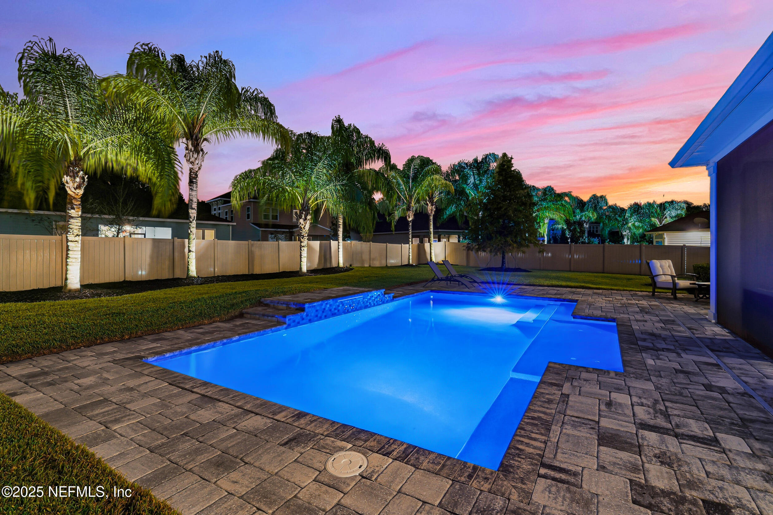 375 Kirkside Avenue St. Augustine, FL 32095 - Photo 27 of 49 a view of swimming pool with lawn chairs and palm tree