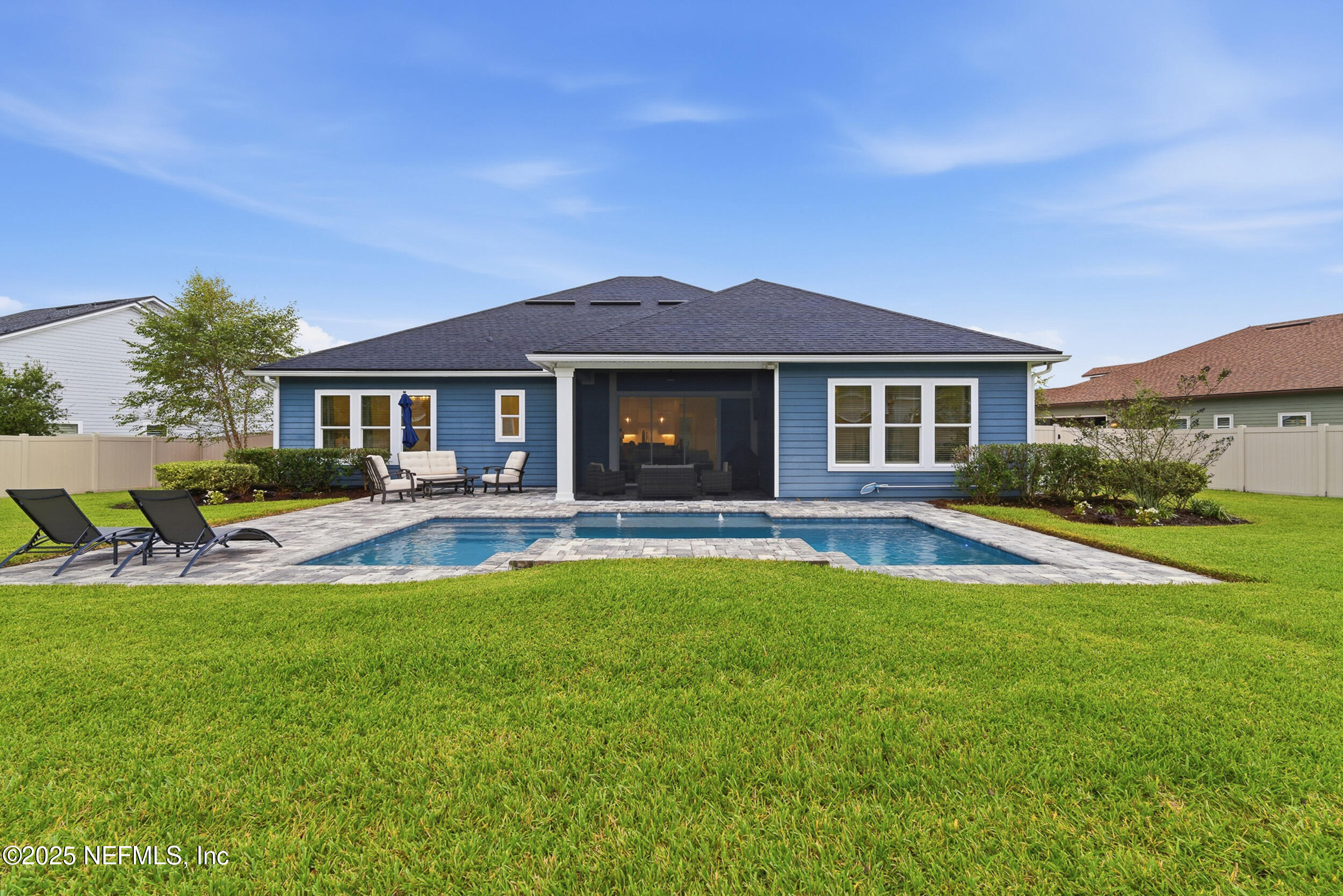 375 Kirkside Avenue St. Augustine, FL 32095 - Photo 28 of 49 a front view of a house with swimming pool having outdoor seating