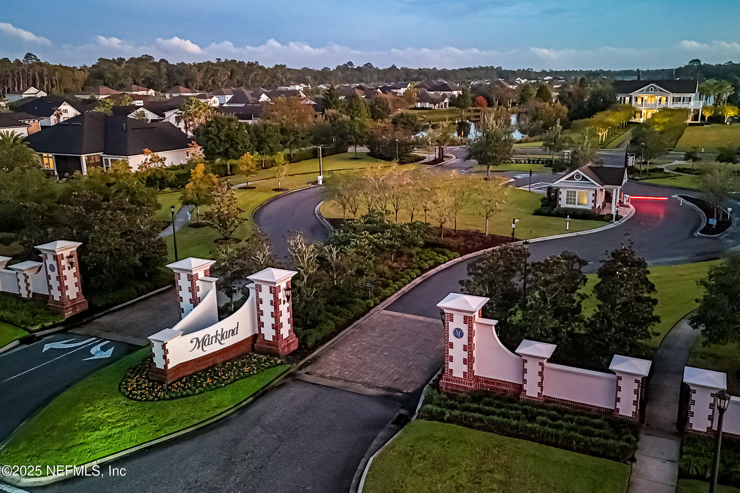 375 Kirkside Avenue St. Augustine, FL 32095 - Photo 2 of 49 an aerial view of a house with a garden and lake view