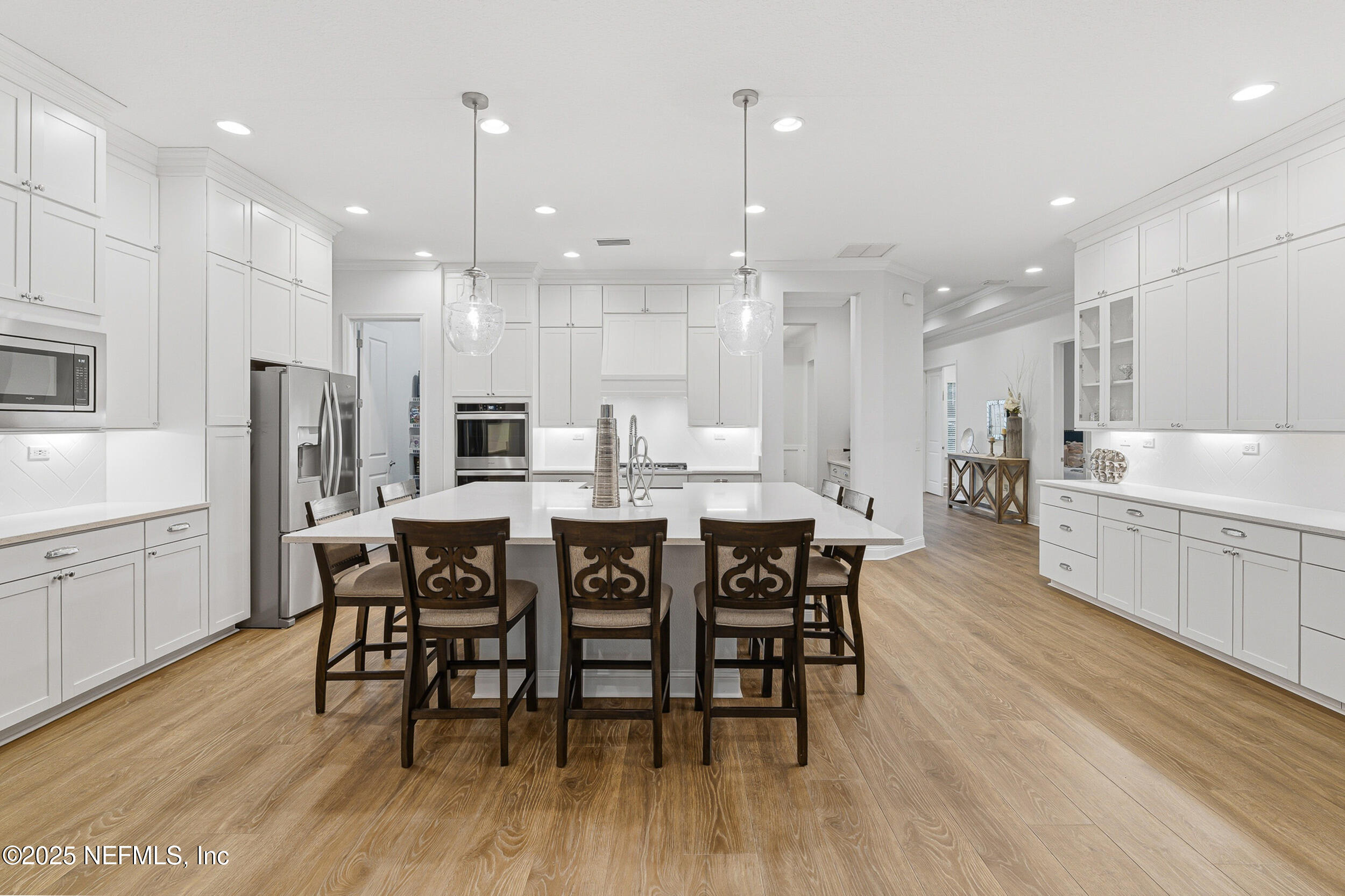 375 Kirkside Avenue St. Augustine, FL 32095 - Photo 5 of 49 a large kitchen with a table and chairs