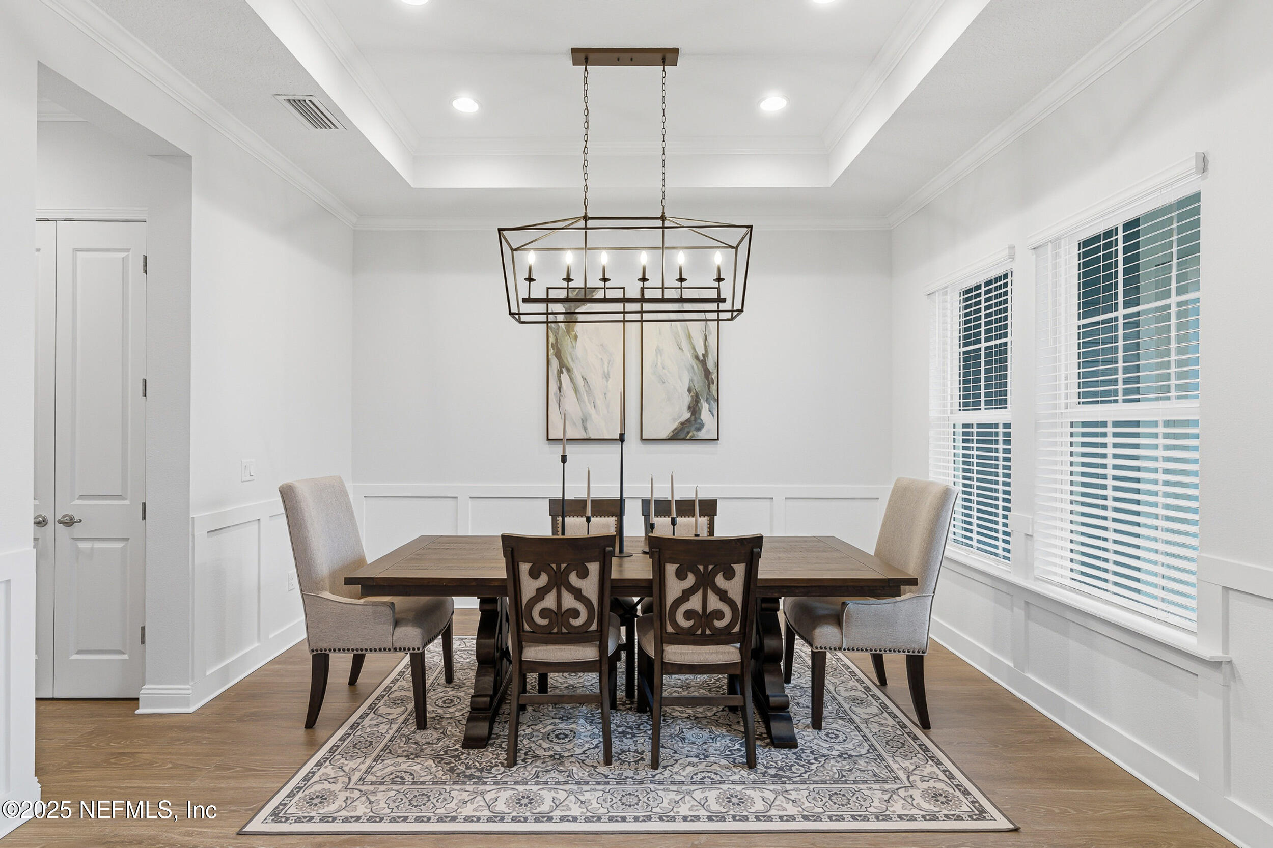 375 Kirkside Avenue St. Augustine, FL 32095 - Photo 7 of 49 a view of a dining room with furniture window and wooden floor