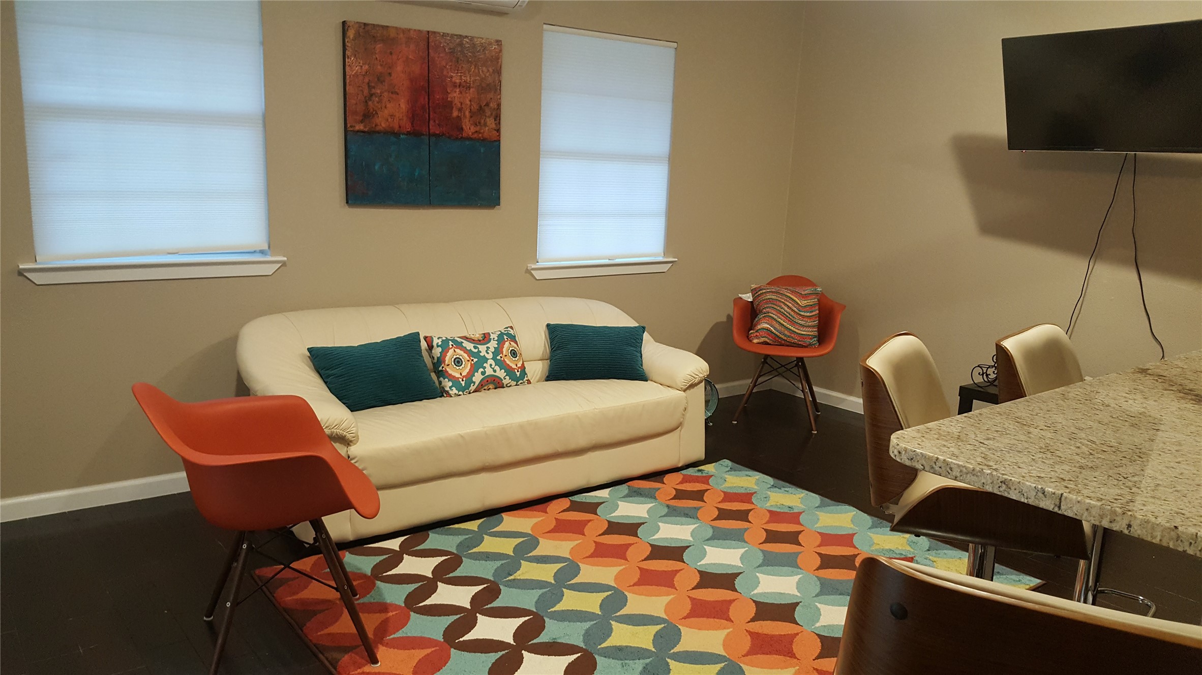 12410 Twin Creek Road Manchaca, TX 78652 - Photo 28 of 32 Living room with baseboards and wood finished floors