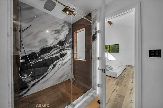 a bathroom with a bathtub and a sink