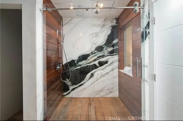 a living room with a couch and a flat screen tv