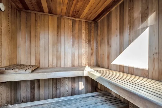 a view of a balcony with furniture and stairs