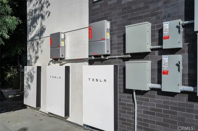 a front view of a house with parking area