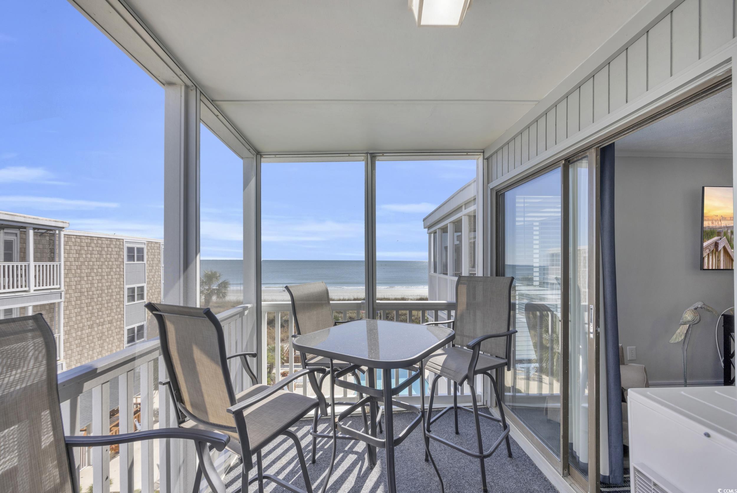 2405 South Ocean Boulevard, Unit 306 North Myrtle Beach, SC 29582 - Photo 2 of 37 Sunroom / solarium featuring a water view and a vi