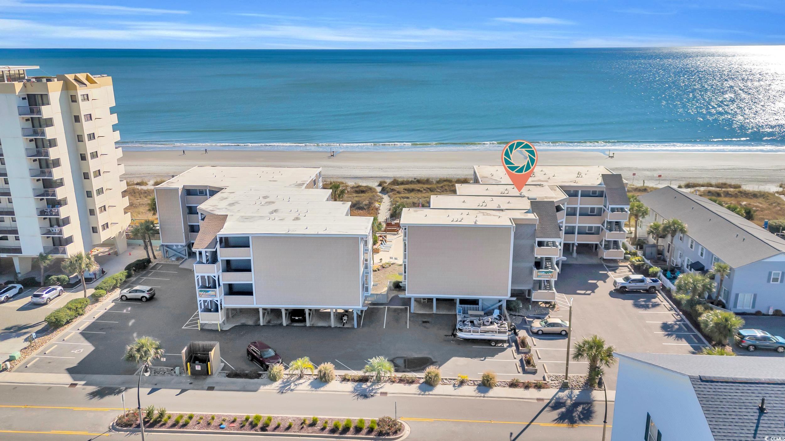 2405 South Ocean Boulevard, Unit 306 North Myrtle Beach, SC 29582 - Photo 33 of 37 Bird's eye view featuring a beach view and a water