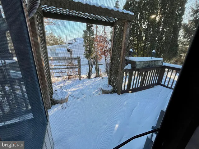 a view of balcony with furniture