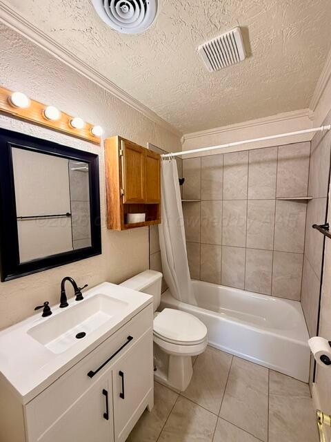 4623 Crockett Street Amarillo, TX 79110 - Photo 9 of 9 a bathroom with a sink toilet and shower