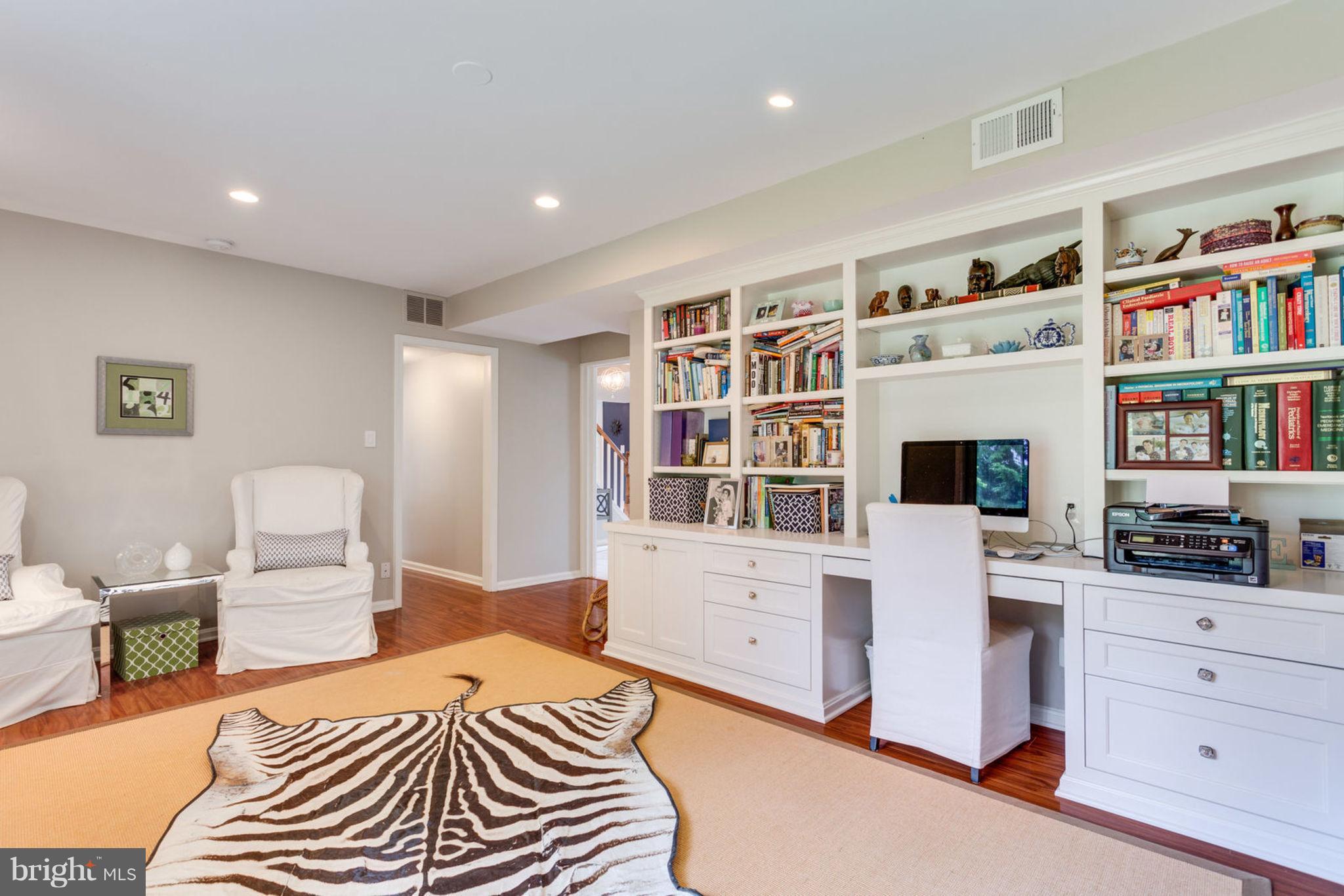7102 Thrasher Road McLean, VA 22101 - Photo 11 of 23 Built-in shelving with work area