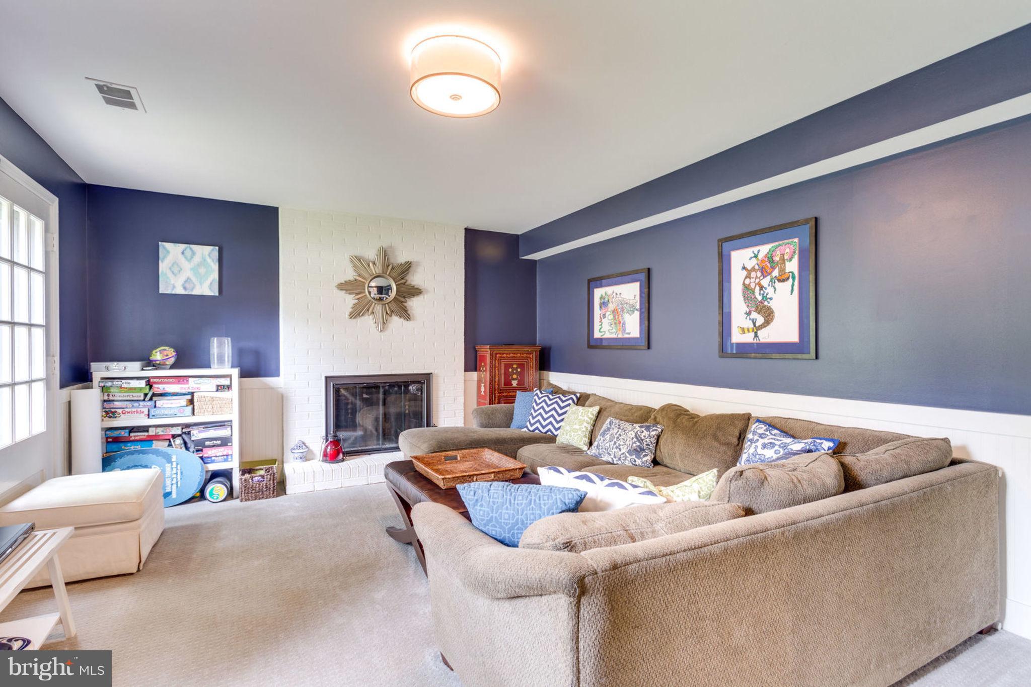 7102 Thrasher Road McLean, VA 22101 - Photo 9 of 23 Cozy family room with fireplace