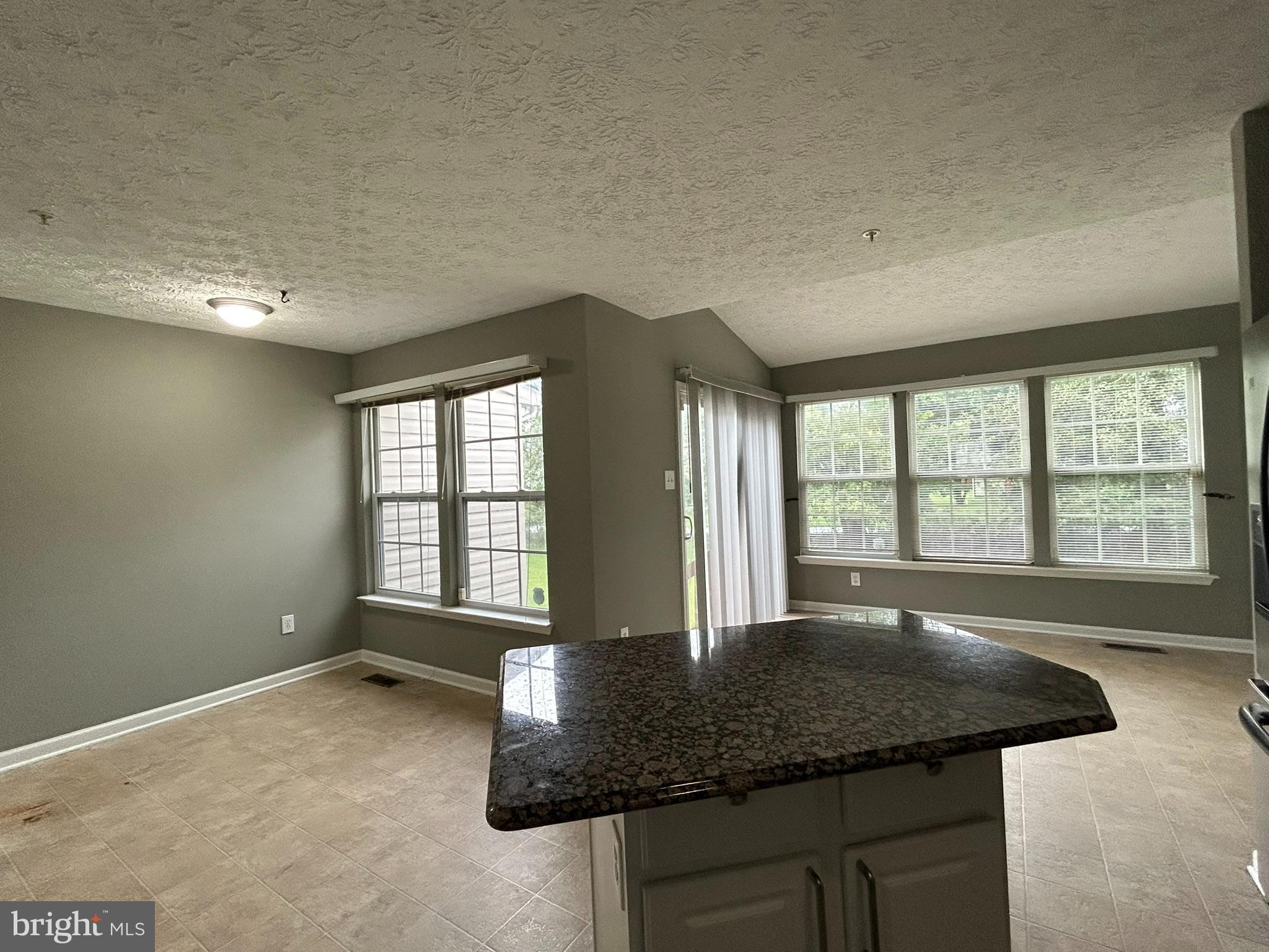 7624 Gladstone Road Windsor Mill, MD 21244 - Photo 11 of 40 Dining & Sunroom