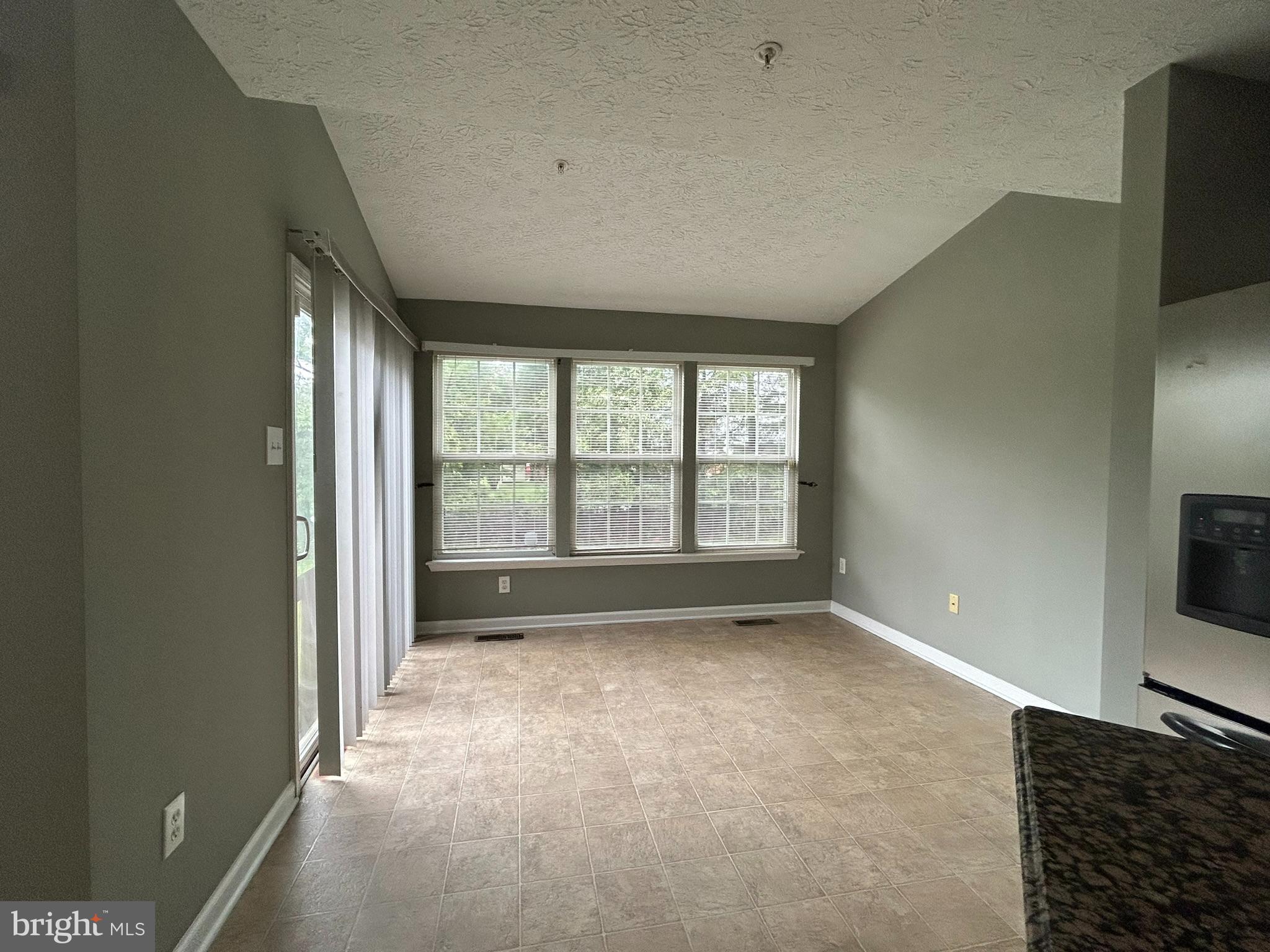 7624 Gladstone Road Windsor Mill, MD 21244 - Photo 9 of 40 Sunroom off Kitchen