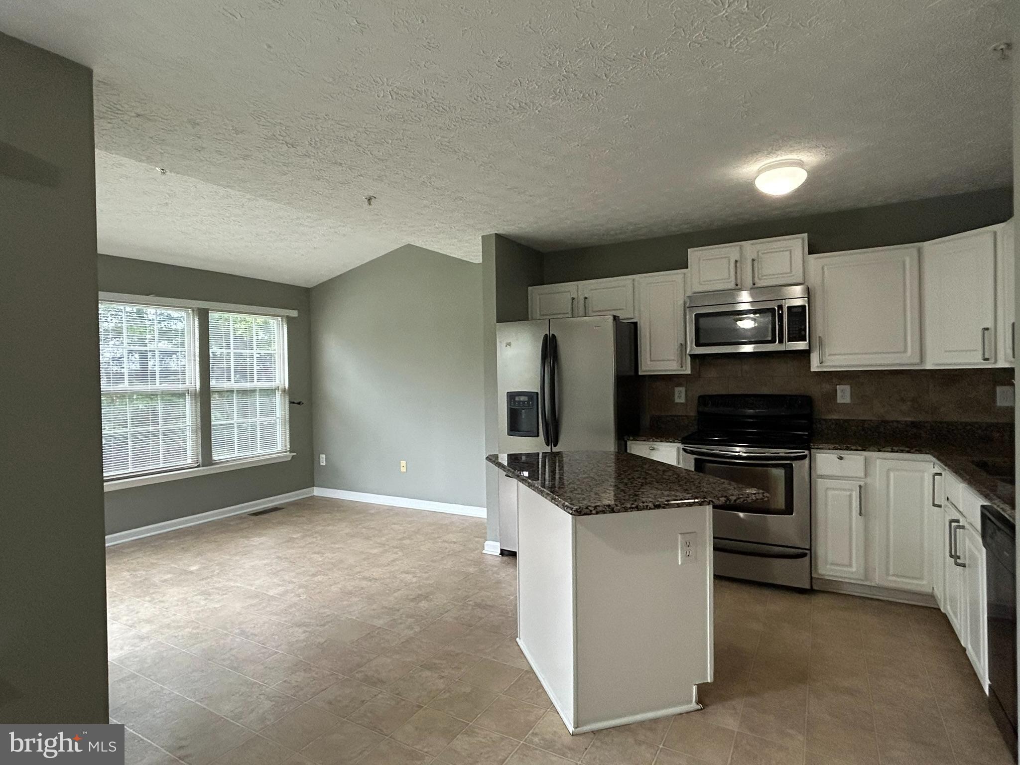 7624 Gladstone Road Windsor Mill, MD 21244 - Photo 10 of 40 Sunroom & Kitchen