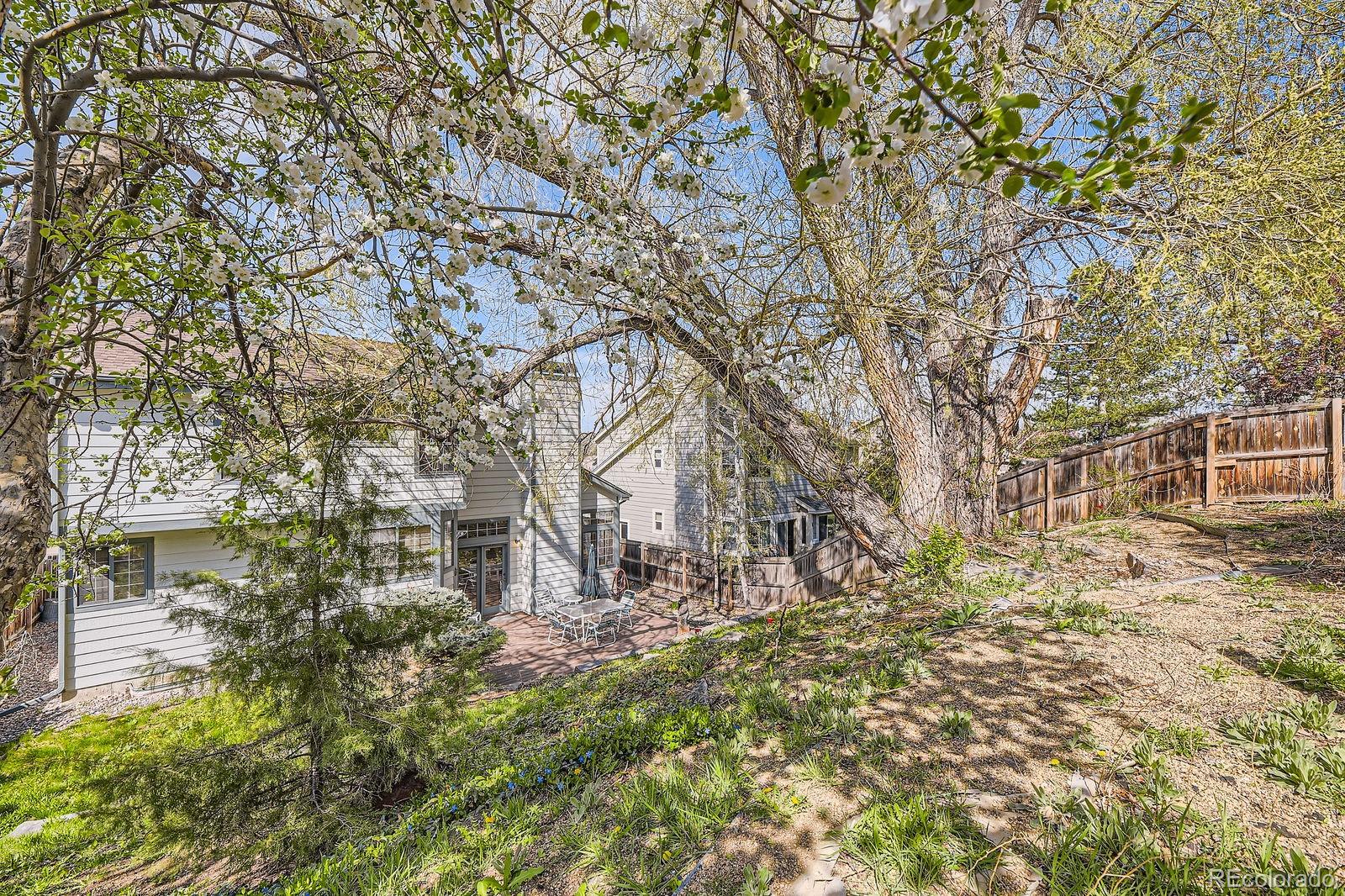 6726 Taft Circle Arvada, CO 80004 - Photo 26 of 41 a view of a house with a yard