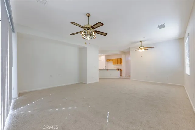a view of a lake with a house in the background